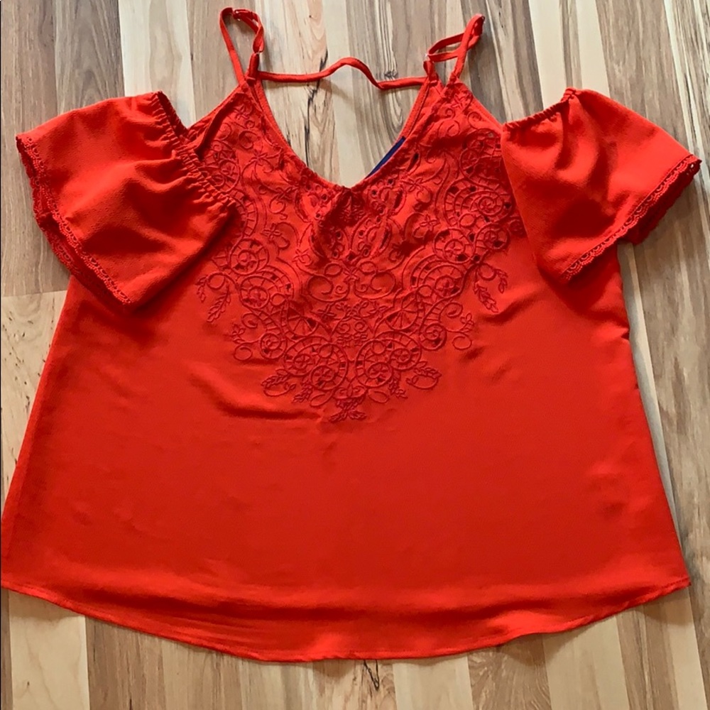 Exposed shoulder blouse